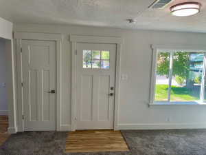 Front door and coat closet