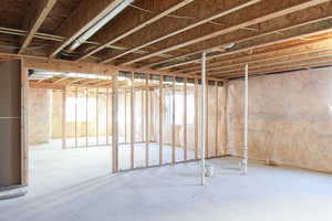 Basement featuring plenty of natural light