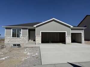 View of front of house with a garage