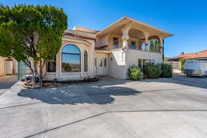 Mediterranean / spanish-style home featuring a balcony