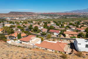 Birds eye view of property with a mountain view