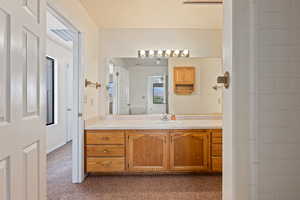 Bathroom with vanity and toilet