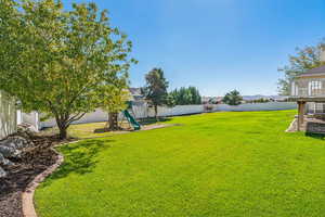 View of yard featuring a playground