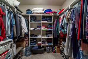 Spacious walk in main bedroom closet