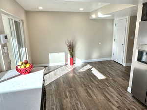 Dining Area Showing Sliding Door to the Patio (Left) and Door to Basement Level (Right)