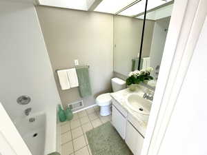 Full Bathroom Upstairs Has Tiled Floor and Huge Mirror. Check it out - The sides slide to the right and left to reveal the shelves behind.