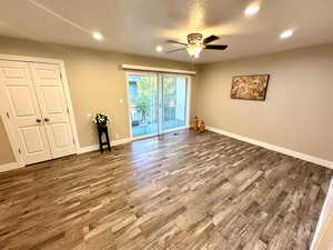 Master Bedroom with Can Lighting, Walk In Closet and Sliding Glass Door Leading to Your Relaxing Balcony