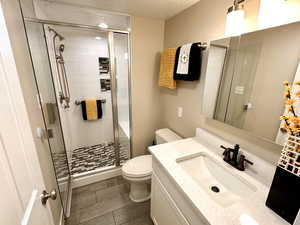 Third Bathroom Down Includes Another All Tiled Shower with Nice Sitting Area and Alcove Shelves for your Body Treatment Bottles and Bars!