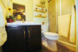 Primary bathroom featuring walk-in shower