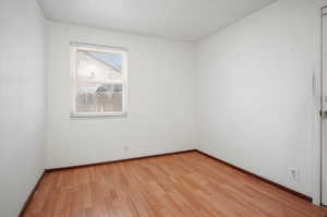 Empty room featuring light hardwood / wood-style floors