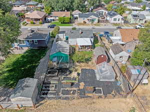 Bird's eye view with Greenhouse, shed, large garden area, garage, large covered back porch