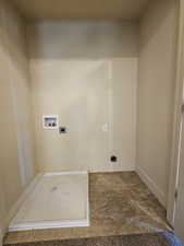 Laundry area featuring hookup for a washing machine and electric dryer hookup