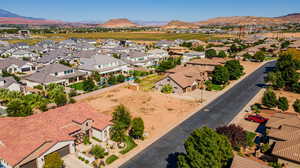 Birds eye view of property with a mountain view