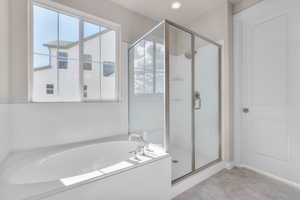 Bathroom with plus walk in shower