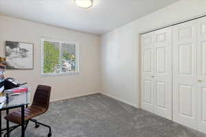 Office area featuring carpet floors