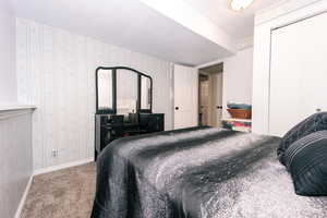 Bedroom featuring carpet flooring