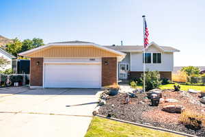 View of front of property with a garage