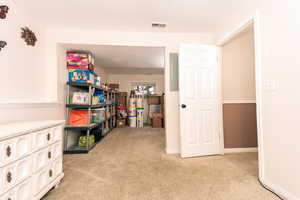 Playroom featuring light carpet