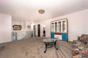 Living room with carpet flooring