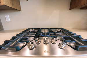 Details featuring stainless steel gas stovetop