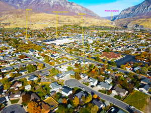 Birds eye view of property with a mountain view