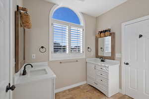 Jack and Jill bath between upper level bedroom one and two