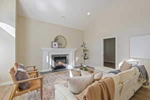 Main level formal living room with vaulted ceilings