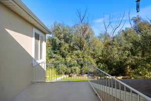 Private back deck off of upper primary suite