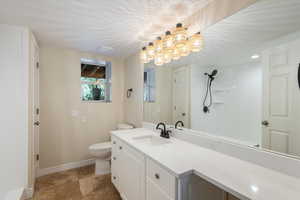 Lower level three-quarter bath with large shower - new glass doors coming soon!