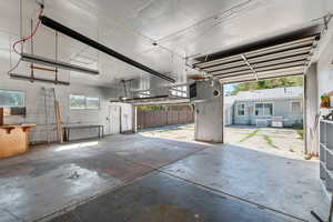 View from garage to house with doors open