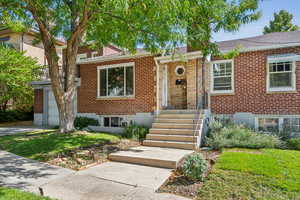 View of front of home with a front lawn