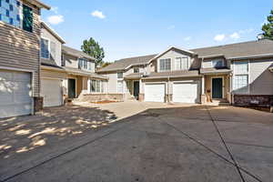 View of front of property with a garage