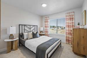 View of carpeted bedroom *Photo is of an existing home of the same layout. Colors for listed home could vary*