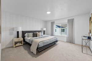 Bedroom with light colored carpet *Photo is of an existing home of the same layout. Colors for listed home could vary*