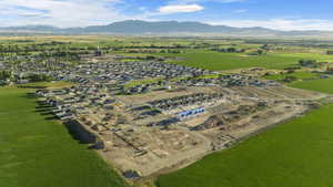 Birds eye view of property with a mountain view