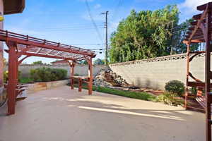 View of patio with a pergola