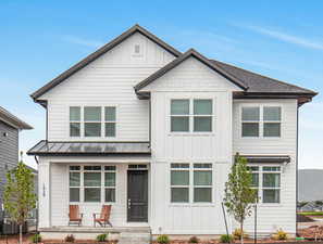 View of modern farmhouse style home