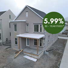 Rear view of property with fence, a patio, and stucco siding