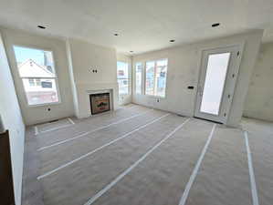 Great room with fireplace- Photo of actual home progress