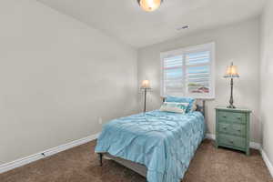 View of carpeted bedroom