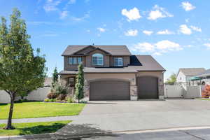 View of front of house with a front lawn