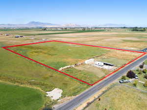 Drone / aerial view featuring a mountain view and a rural view