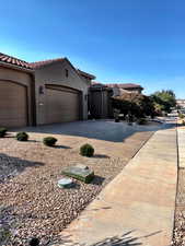 Street View of home featuring a garage