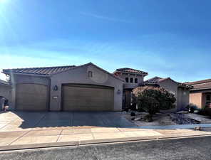 View of front of house featuring a 3 car garage