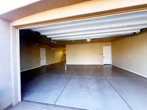 Garage featuring epoxy floor, heat and a/c. Extra length