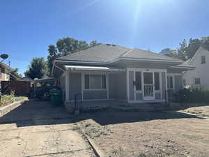 Bungalow featuring a carport and covered porch