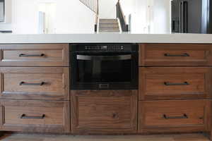 Kitchen with high end refrigerator and oven