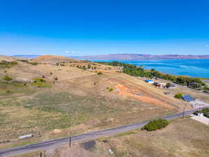 Bird's eye view with a water and mountain view and a rural view