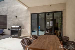 Dining space featuring ceiling fan and french doors