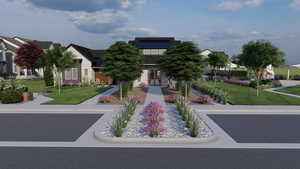 View of front of property with a front yard and french doors